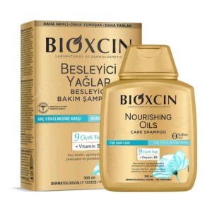 شامپو ضدریزش بیوکسین مدل روغن 9 گیاه طلایی بدون سولفات مناسب موهای خشک و اسیب دیده 300 میل BIOXCIN